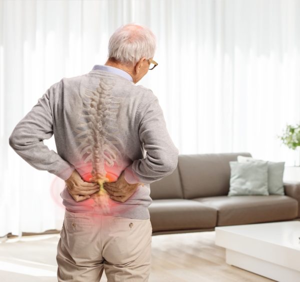 Rear,View,Shot,Of,An,Elderly,Man,In,Pain,Holding